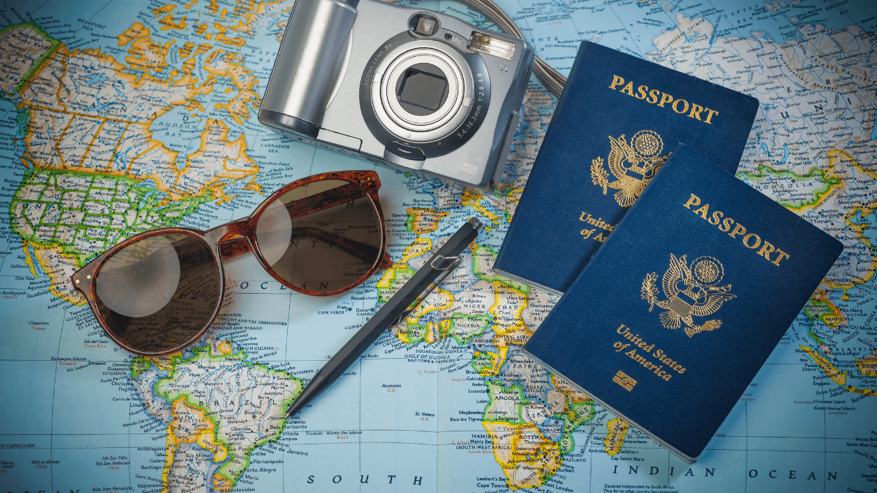 Travel | Scott Legal, P.C. Passport, sunglasses, camera, travel