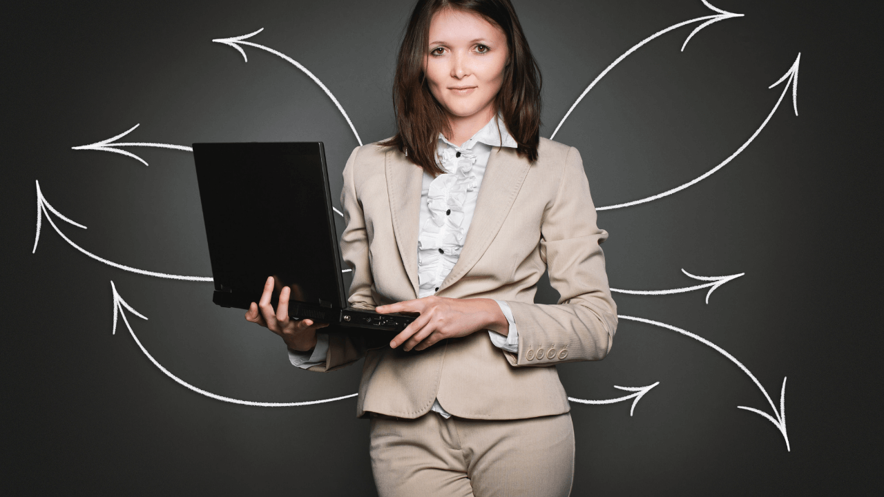 Woman holding laptop | Scott Legal, P.C. Woman holding laptop
