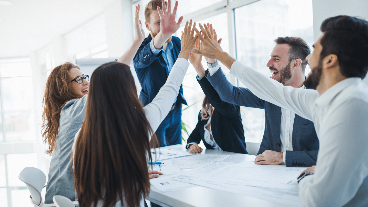 Business team high five | Scott Legal, P.C. Business team high five
