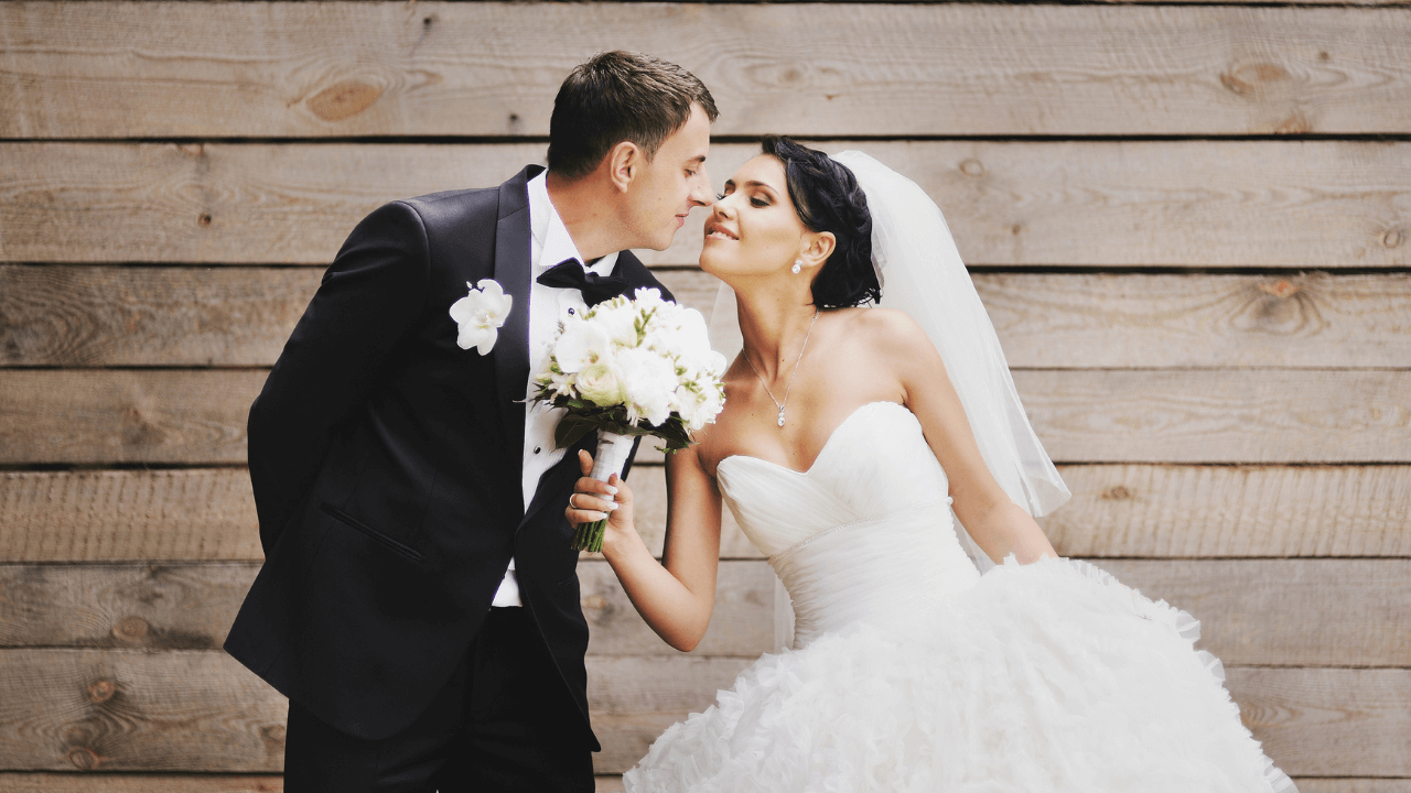 Married couple on their wedding day | Scott Legal, P.C. Married couple on their wedding day