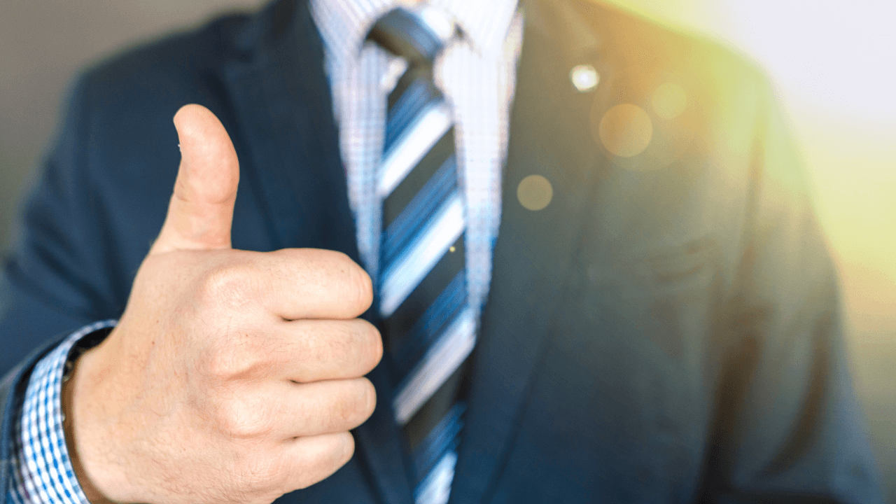 Business man thumbs up | Scott Legal, P.C. Business man thumbs up