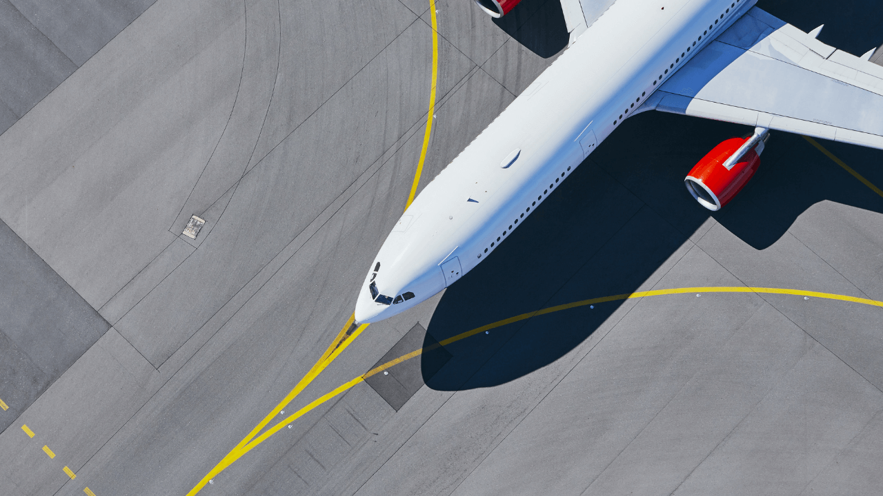 Airplane on a runway | Scott Legal, P.C. Airplane on a runway