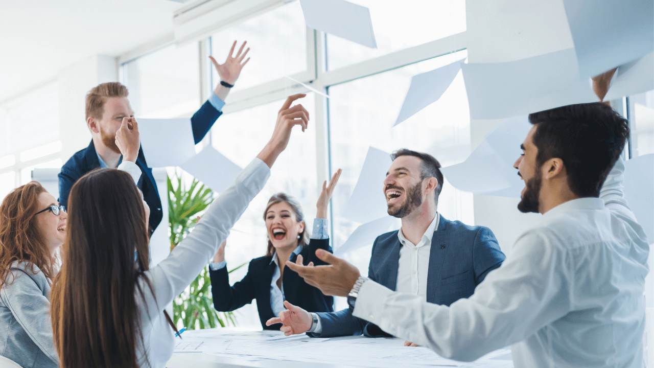 Office team celebrating a win | Scott Legal, P.C. Office team celebrating a win