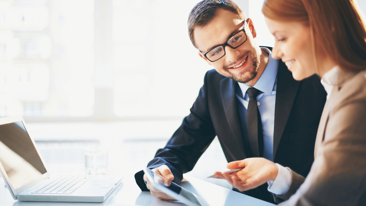 Business man and woman | Scott Legal, P.C. Business man and woman
