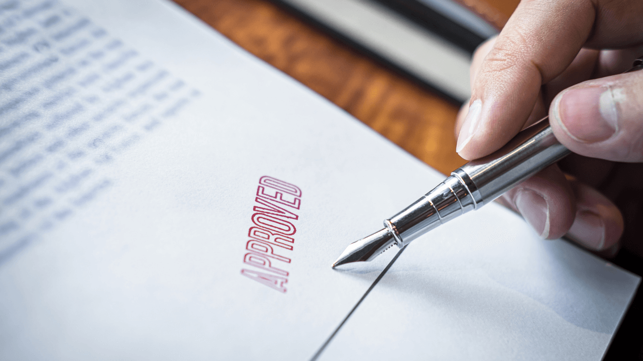 Approved stamp on a bunch of documents | Scott Legal, P.C. Approved stamp on a bunch of documents