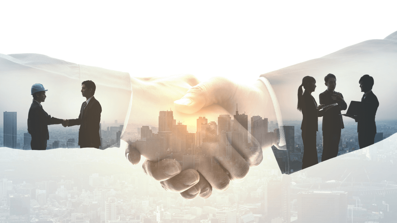 Two partners shaking hands | Scott Legal, P.C. Two partners shaking hands