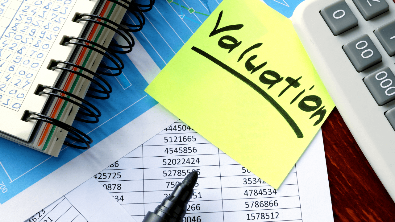 Charts, numbers, and valuation on a post it note | Scott Legal, P.C. Charts, numbers, and valuation on a post it note