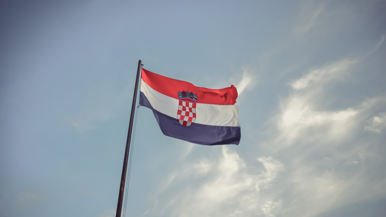Croatia flag blowing in the wind | Scott Legal, P.C. Croatia flag blowing in the wind