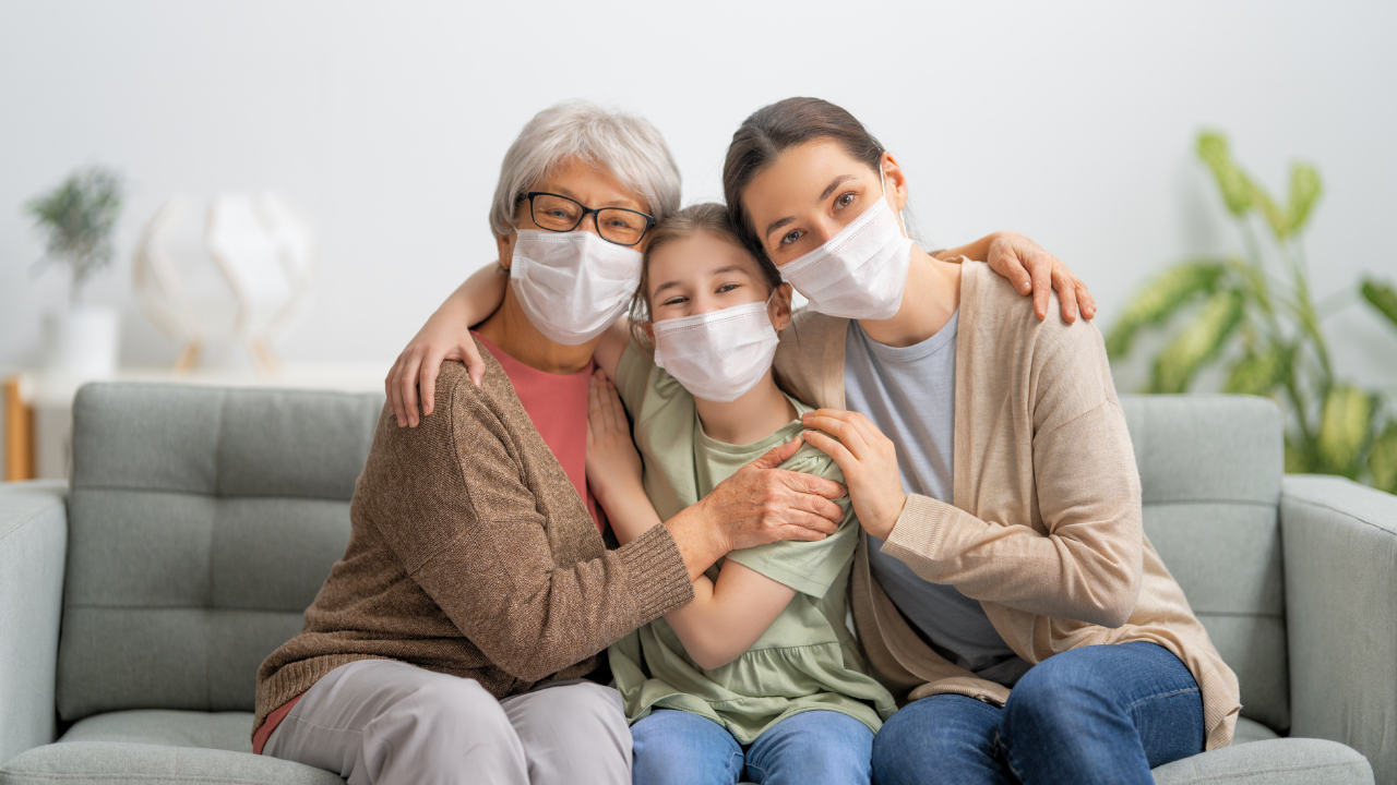 a happy family wearing masks | Scott Legal, P.C. a happy family wearing masks