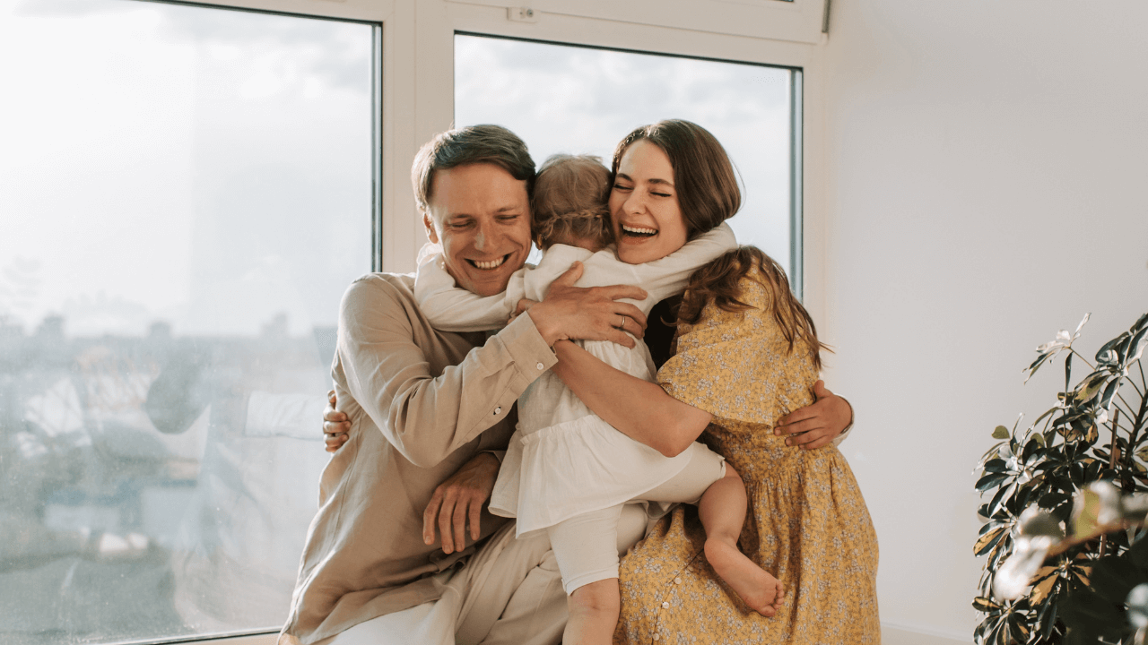 a happy family hugging | Scott Legal, P.C. a happy family hugging