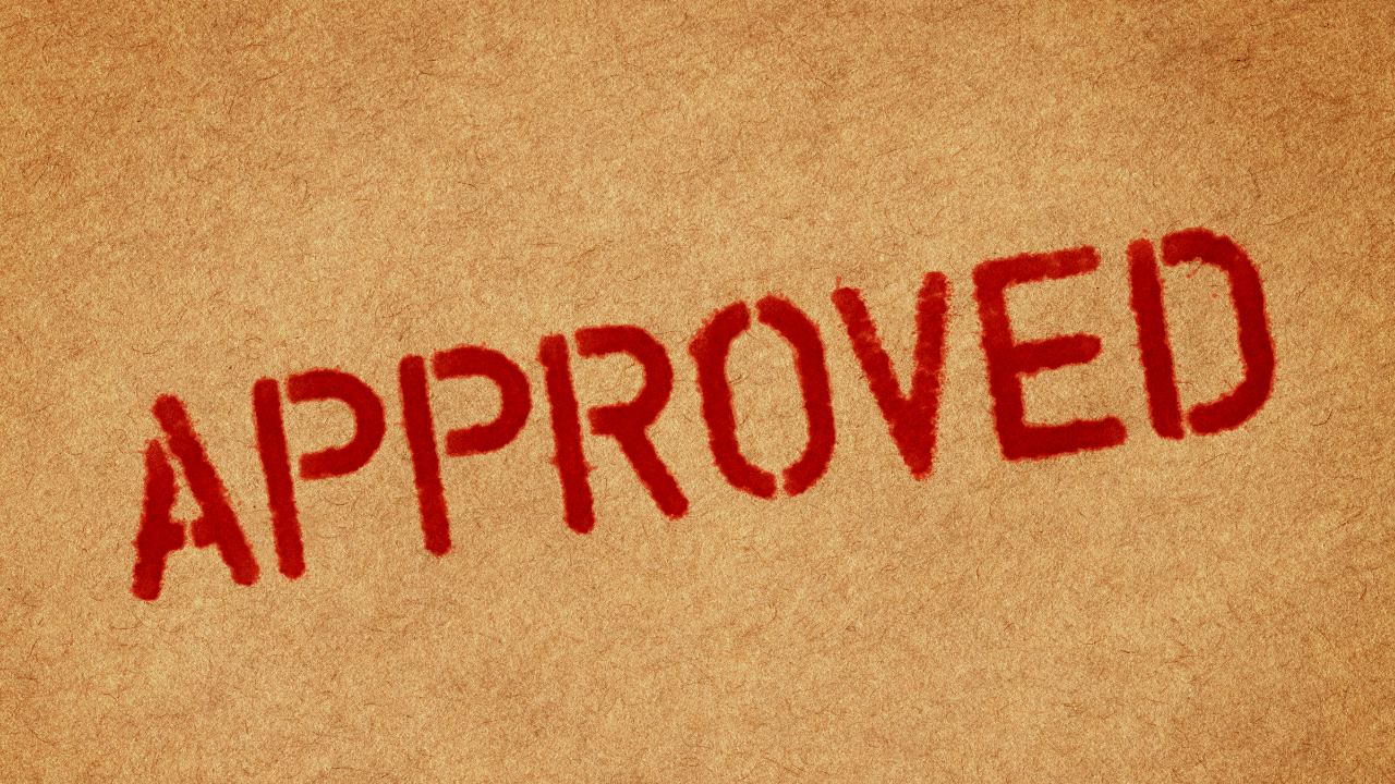 Approved stamped on a brown envelope | Scott Legal, P.C. Approved stamped on a brown envelope
