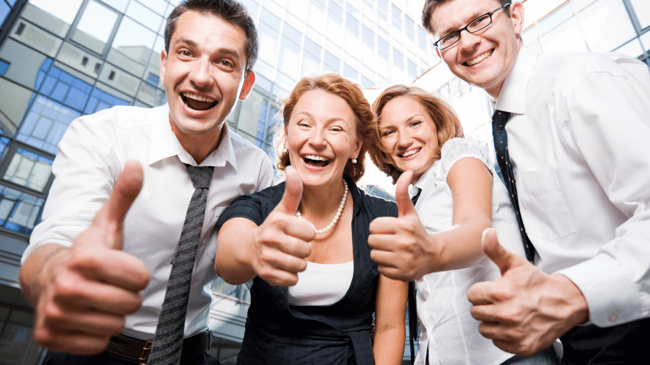 Office team celebrating a win | Scott Legal, P.C. Office team celebrating a win
