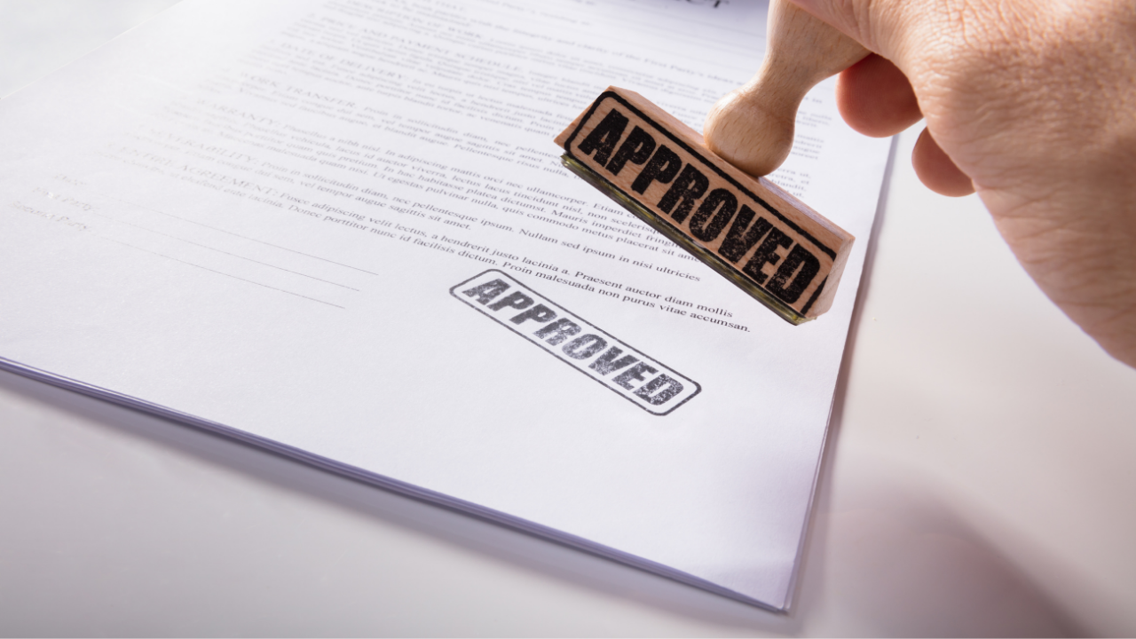 Approved stamp | Scott Legal, P.C. Approved stamp on a white piece of paper