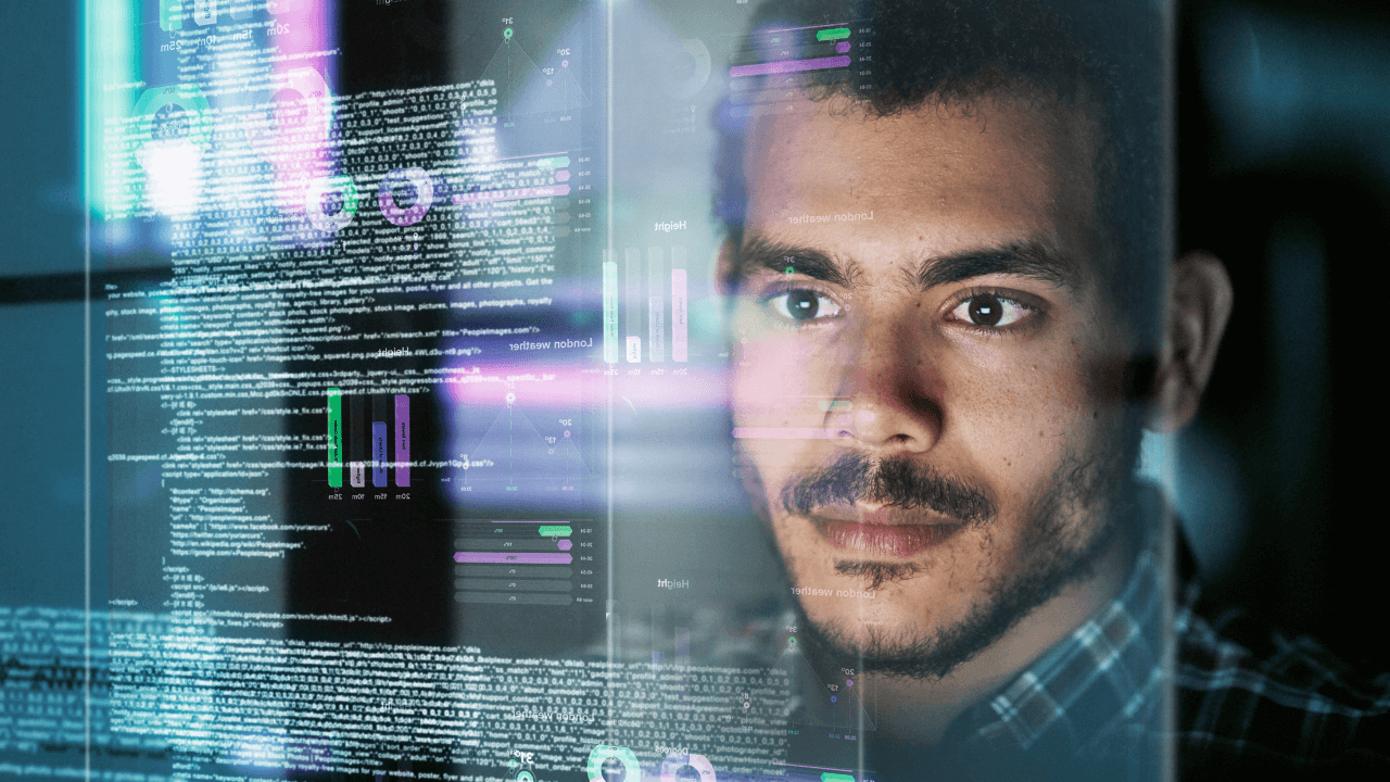 a software engineer looking at code | Scott Legal, P.C. a software engineer looking at code on a board