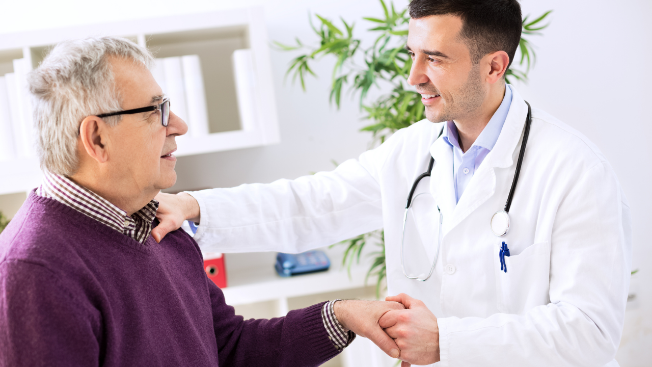 A doctor speaking with one of their patients | Scott Legal, P.C. A doctor speaking with one of their patients
