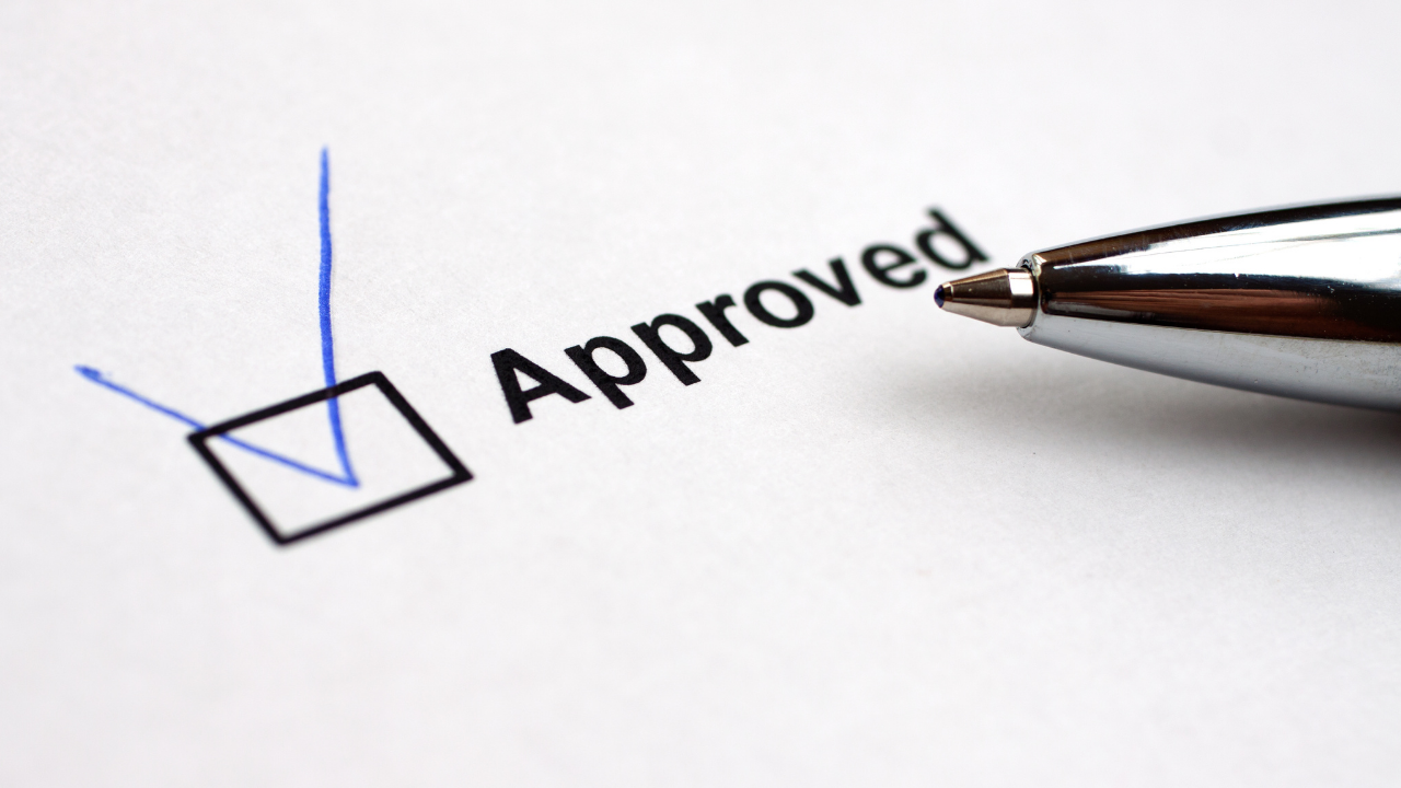 Approved checked on paper | Scott Legal, P.C. Approved checked on paper in blue pen