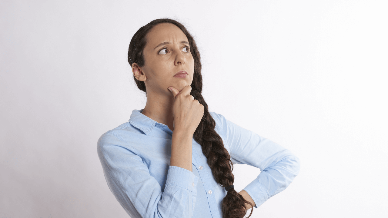 A woman considering her options | Scott Legal, P.C. A woman considering her options