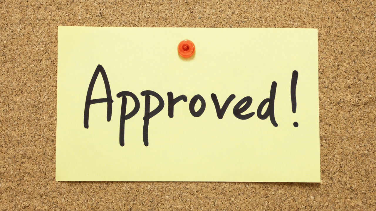 Approved post it on a cork board | Scott Legal, P.C. Approved post it on a cork board