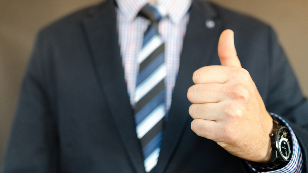 Man giving the thumbs up | Scott Legal, P.C. Man giving the thumbs up