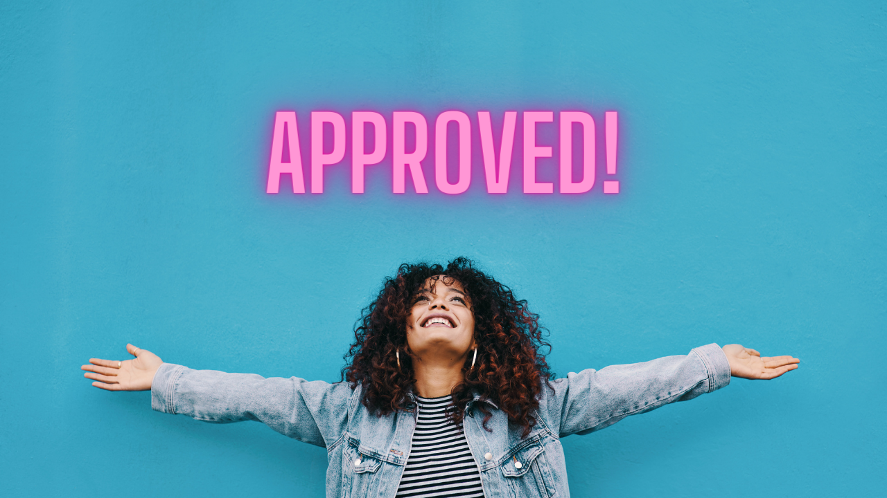 A woman happily looking up at "approved" | Scott Legal, P.C. A woman happily looking up at "approved"