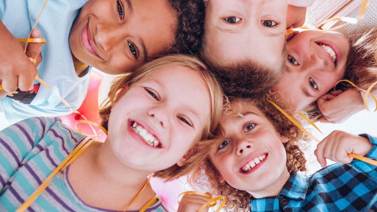 A group of children playing together | Scott Legal, P.C. A group of children playing together