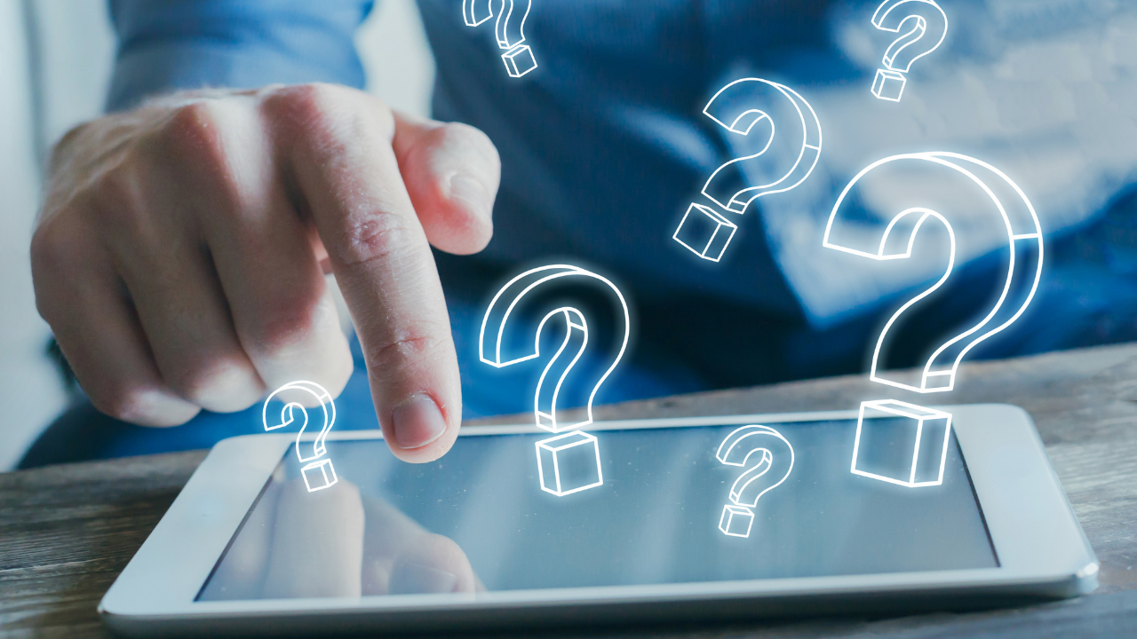 A man looking at answers to his questions on his ipad | Scott Legal, P.C. A man looking at answers to his questions on his ipad