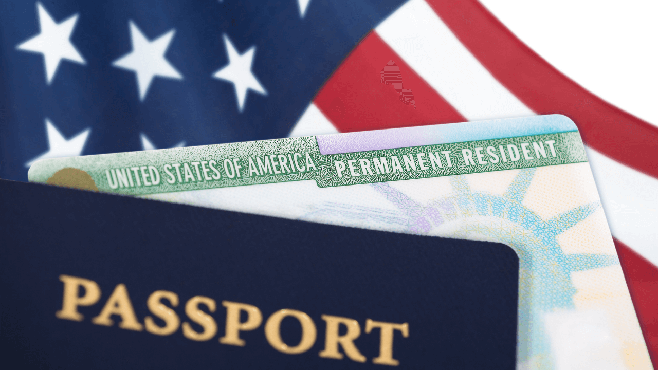 A passport and green card with the USA flag | Scott Legal, P.C. A passport and green card with the USA flag