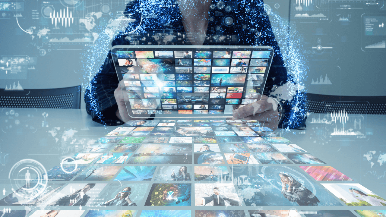 A woman looking at multiple forms of media on a tablet | Scott Legal, P.C. A woman looking at multiple forms of media on a tablet
