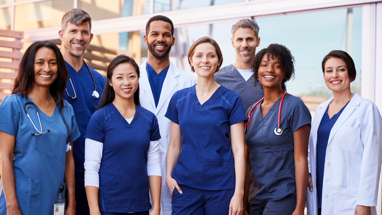 A group of nurses smiling | Scott Legal, P.C. A group of nurses smiling