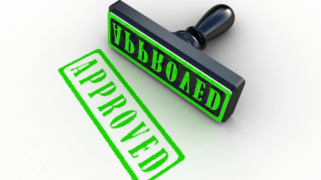 An approved stamp in green | Scott Legal, P.C. An approved stamp in green