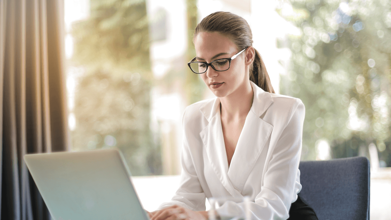 An entrepreneur working on her laptop | Scott Legal, P.C. An entrepreneur working on her laptop
