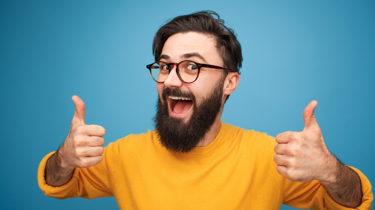A man giving two thumbs up | Scott Legal, P.C. A man giving two thumbs up