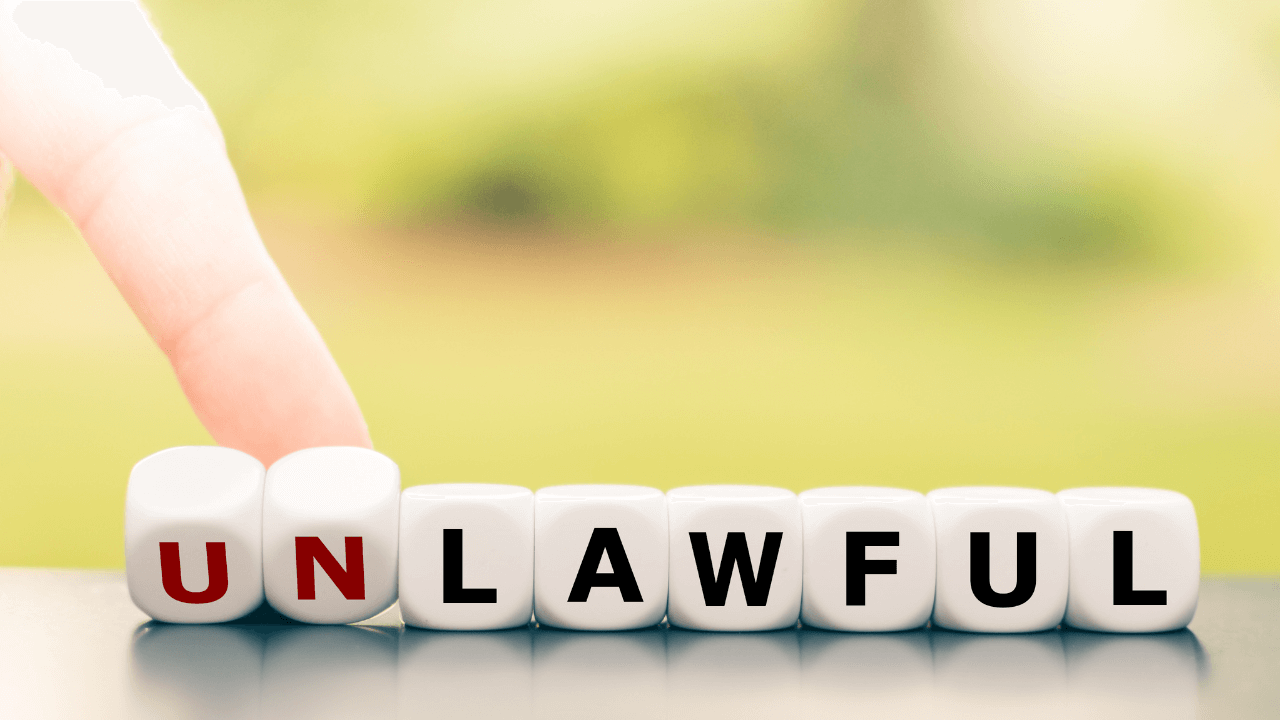 Unlawful spelled out with die pieces | Scott Legal, P.C. Unlawful spelled out with die pieces