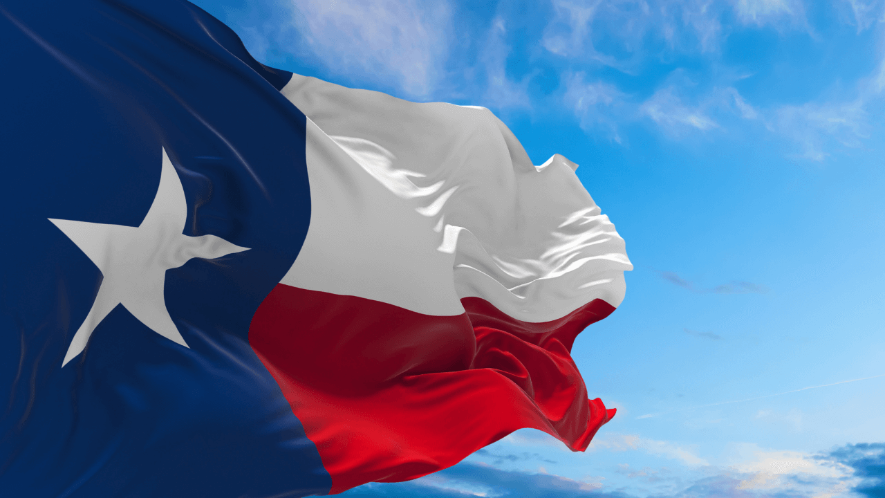 Texas flag blowing in the wins | Scott Legal, P.C. Texas flag blowing in the wins