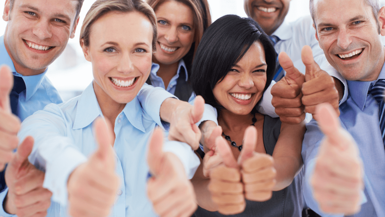 A group of people giving thumbs up | Scott Legal, P.C. A group of people giving thumbs up