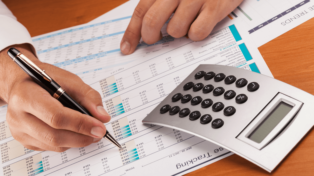 An accountant working | Scott Legal, P.C. An accountant working