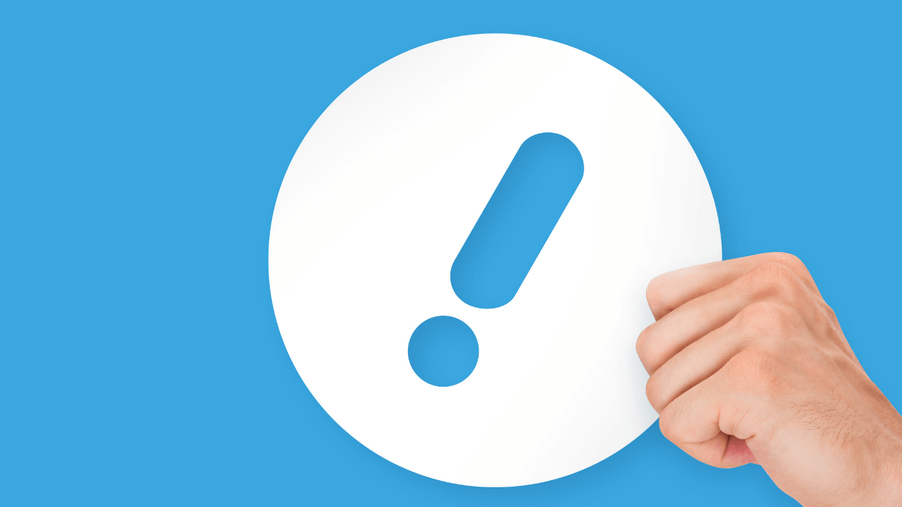 A man holding an exclamation | Scott Legal, P.C. A man holding an exclamation