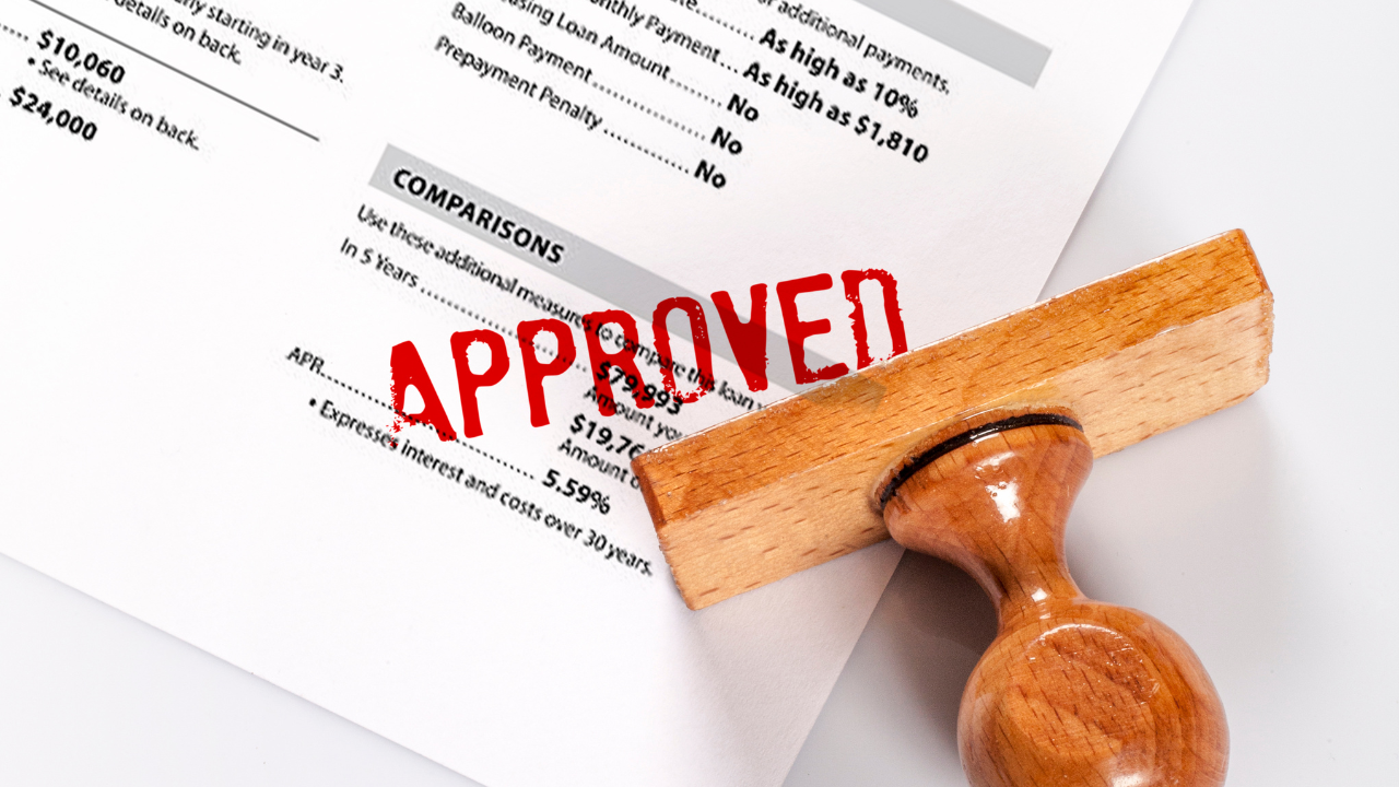 Approved stamp on an application | Scott Legal, P.C. Approved stamp on an application