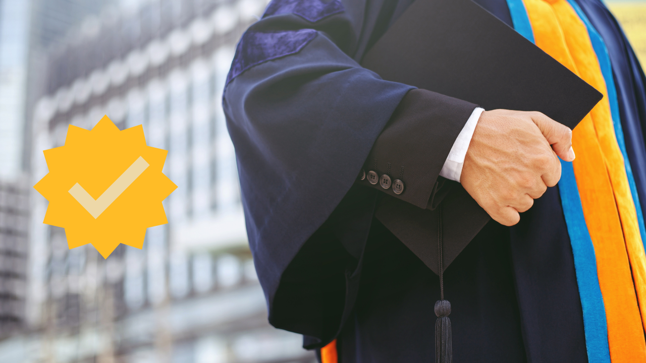 A student in his cap and gown | Scott Legal, P.C. A student in his cap and gown