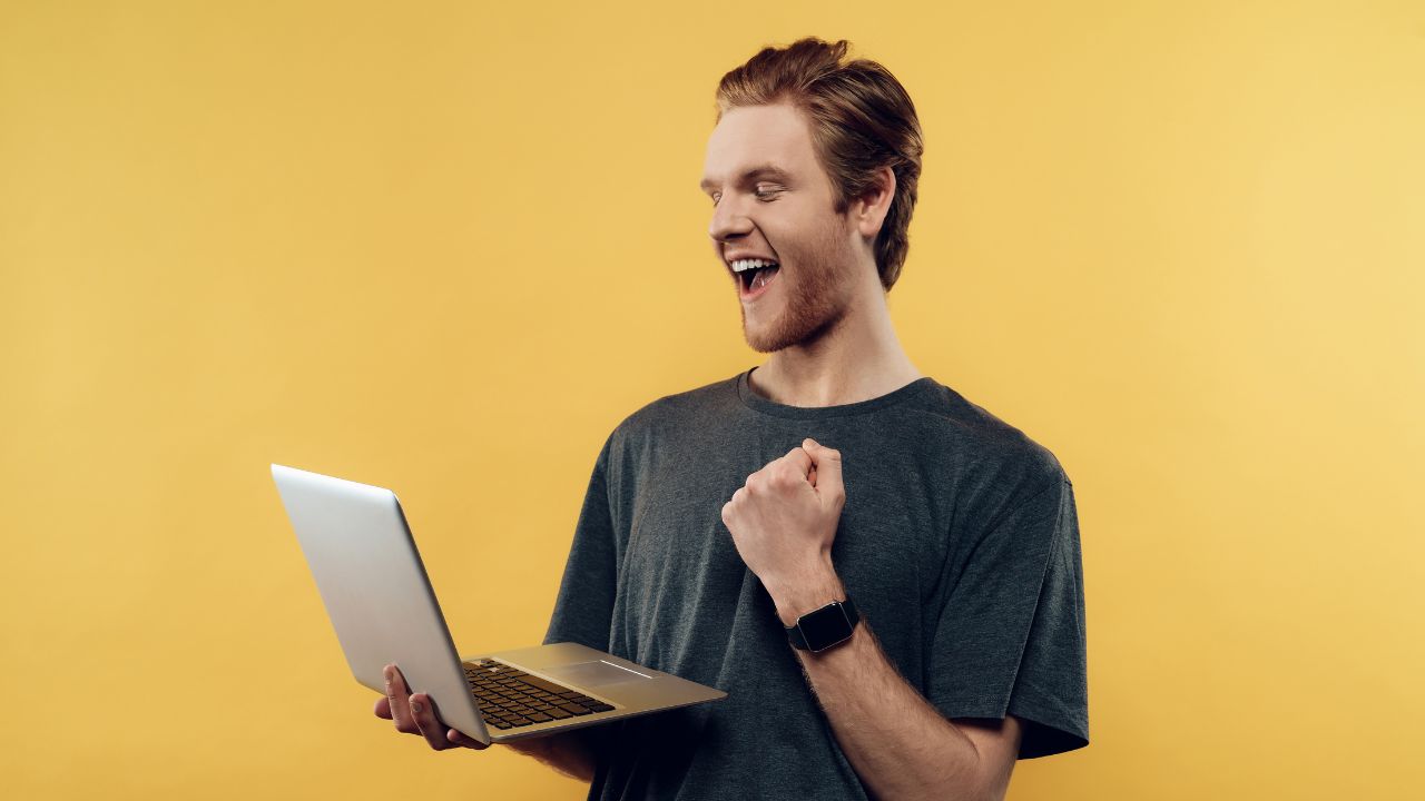 Man celebrating his recent approval | Scott Legal, P.C. Man celebrating his recent approval