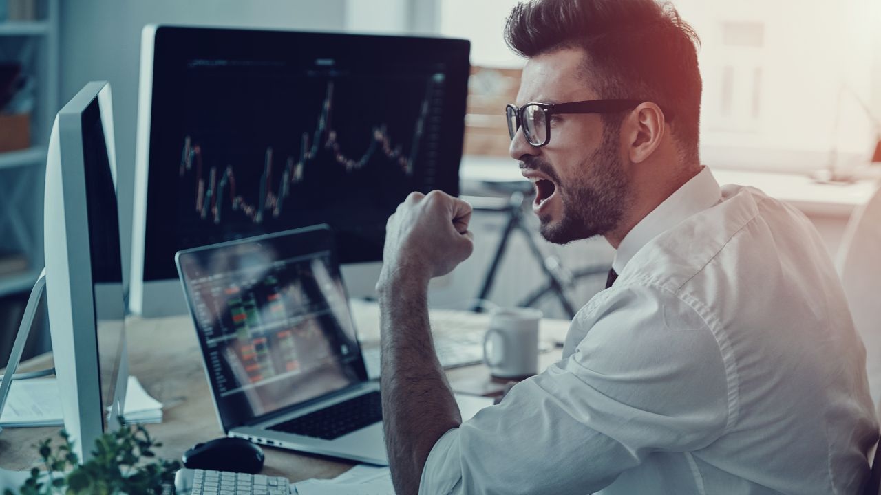 An investor celebrating a win | Scott Legal, P.C. An investor celebrating a win