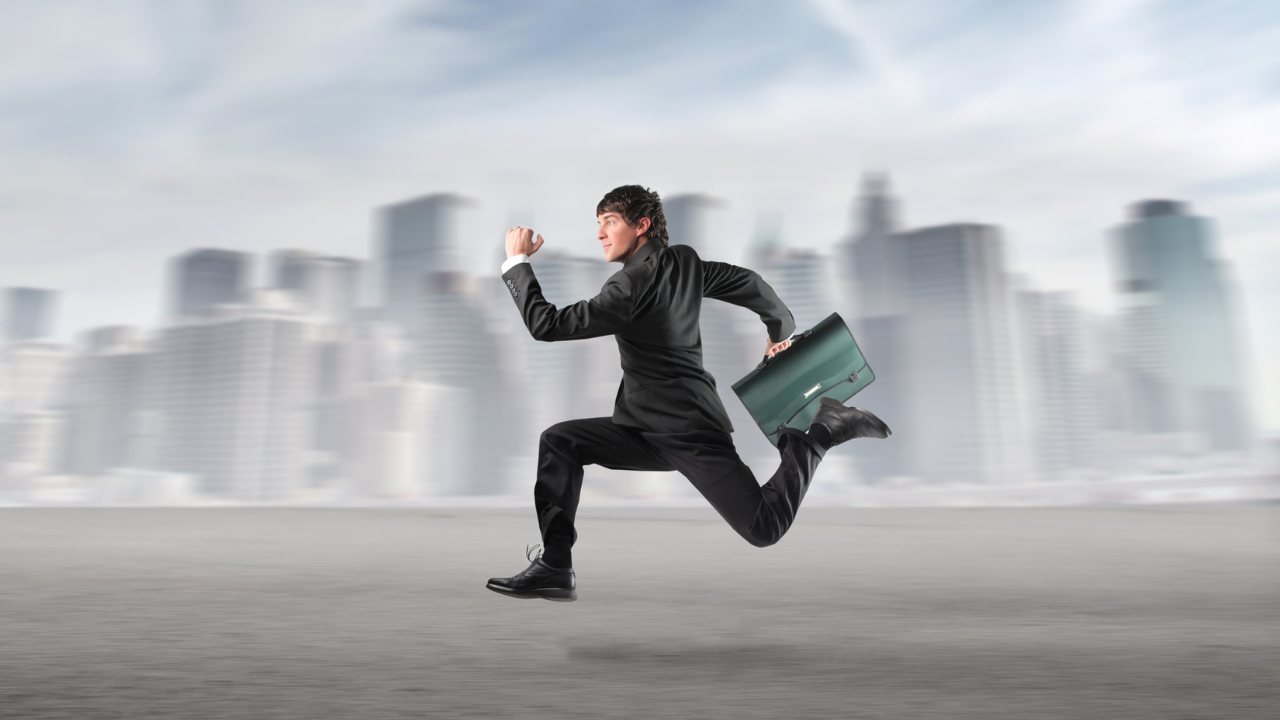 A business man running extremely quickly | Scott Legal, P.C. A business man running extremely quickly