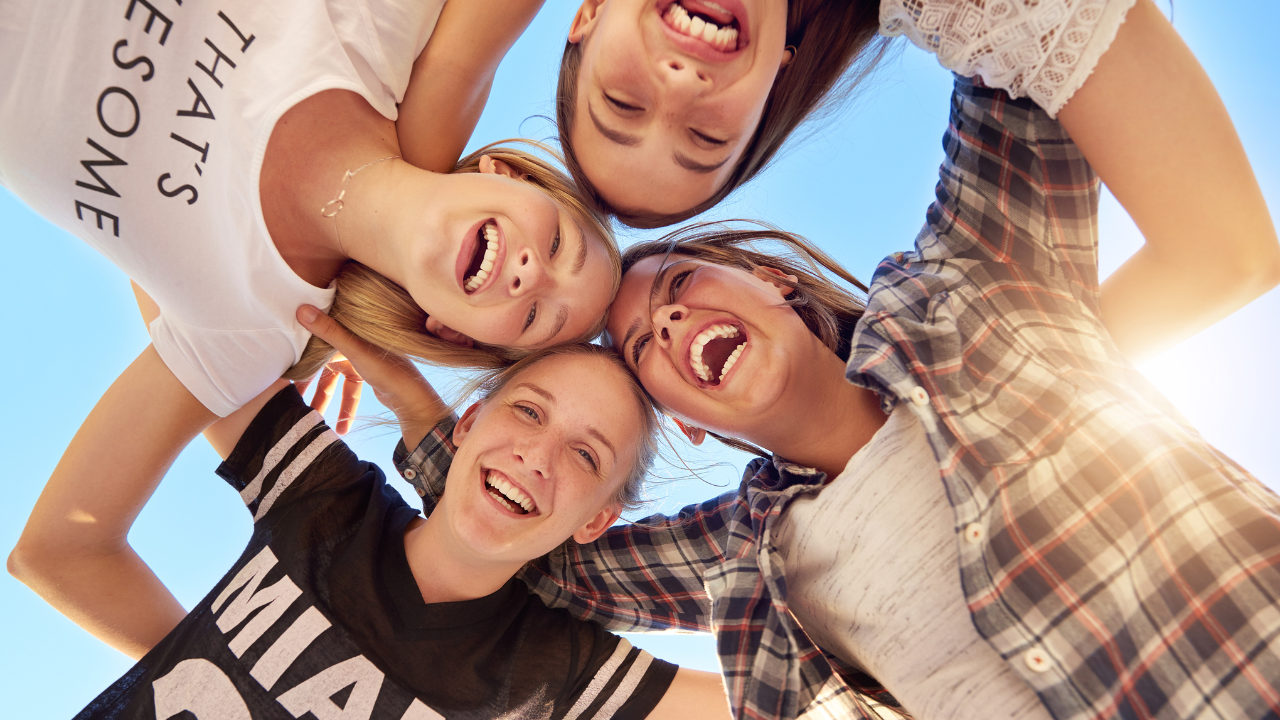A group of teenagers enjoying themselves together | Scott Legal, P.C. A group of teenagers enjoying themselves together