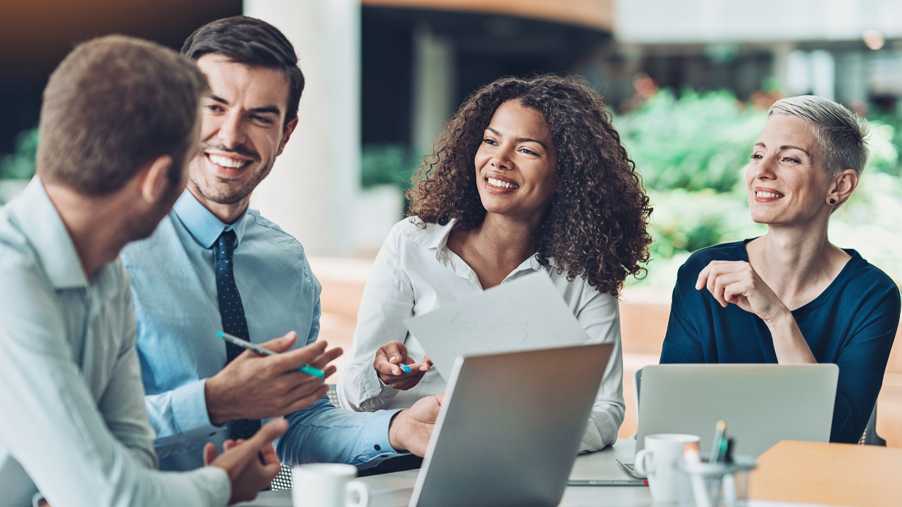 A group of business owners having a discussion | Scott Legal, P.C. A group of business owners having a discussion