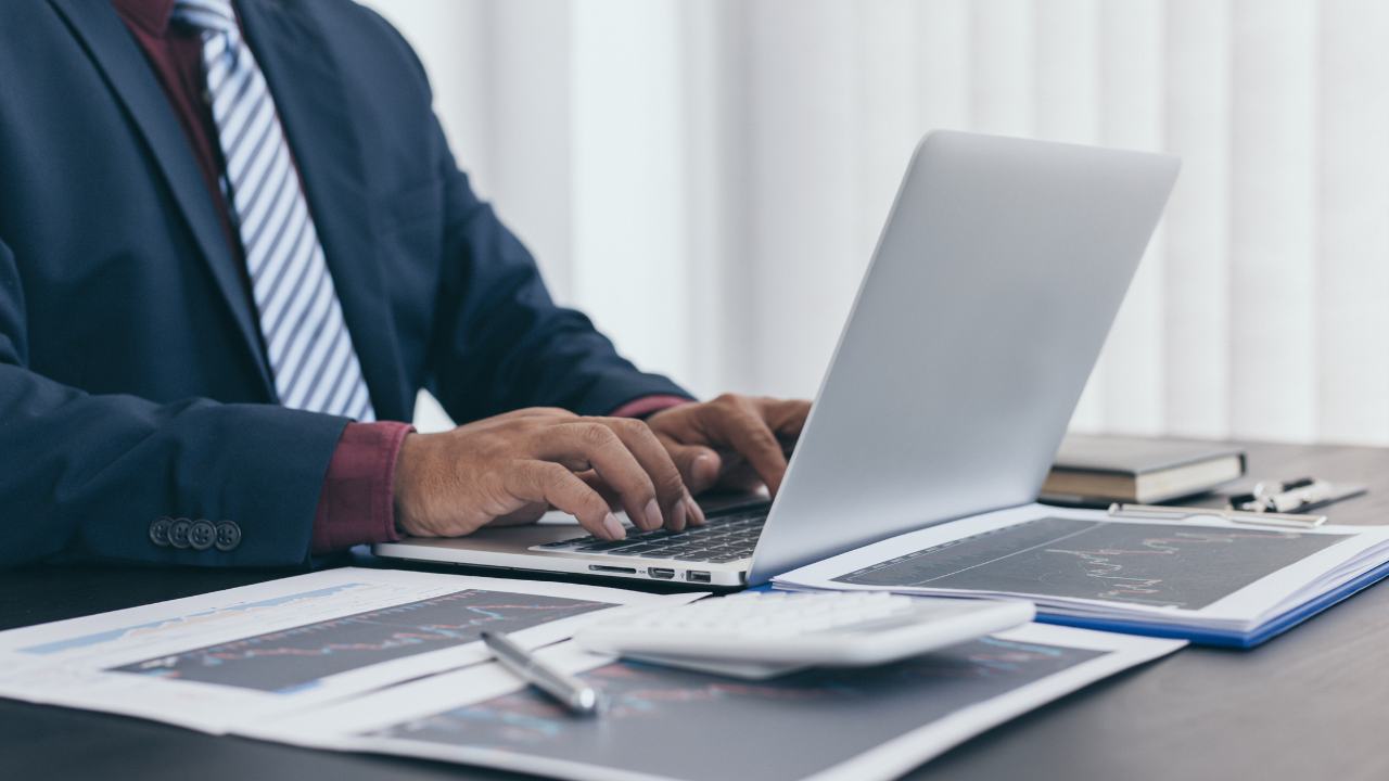 A man working on his laptop | Scott Legal, P.C. A man working on his laptop
