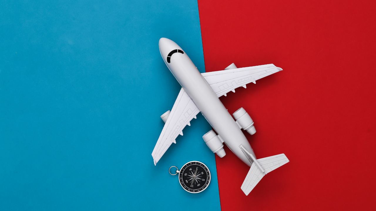 An airplane and compass | Scott Legal, P.C. An airplane and compass