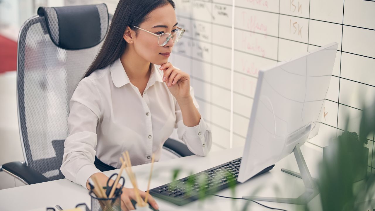 A woman working from her office | Scott Legal, P.C. A woman working from her office