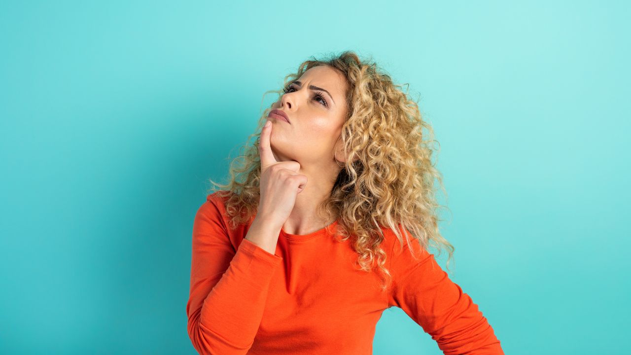 A woman looking at her options | Scott Legal, P.C. A woman looking at her options