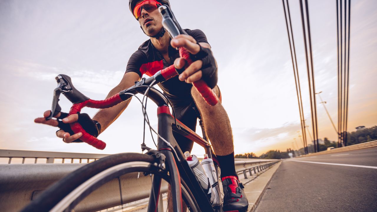 An athlete riding a bike | Scott Legal, P.C. An athlete riding a bike