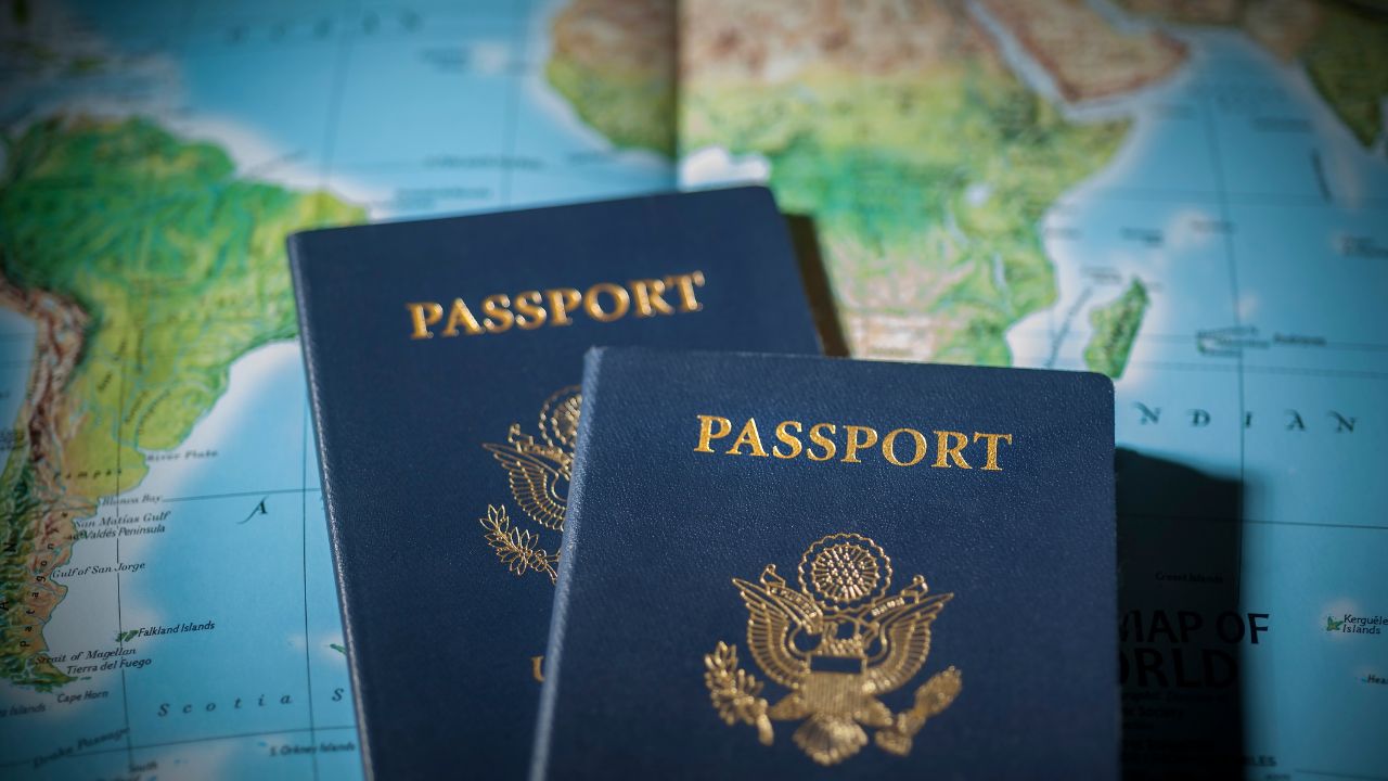 2 passports and a map | Scott Legal, P.C. 2 passports and a map